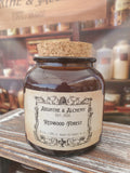 Bottle with cork stopper and vintage-style label on a wooden surface